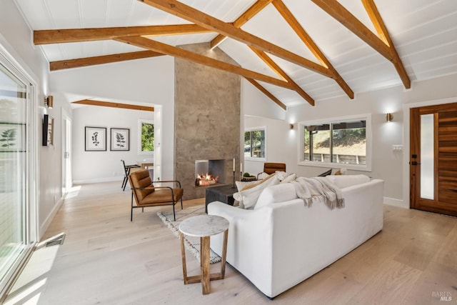 532 Pine Crest Rd, Mill Valley, CA 94941 - living room with light wood-type flooring, beam ceiling, a fireplace, high vaulted ceiling, and baseboards