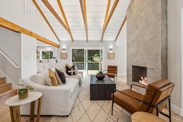 532 Pine Crest Rd, Mill Valley, CA 94941 - living room with healthy amount of natural light, a fireplace, stairs, and baseboards