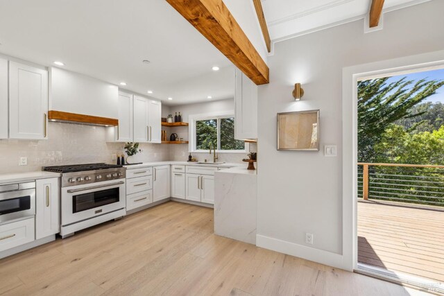 532 Pine Crest Rd, Mill Valley, CA 94941 - kitchen featuring range with gas stovetop, open shelves, tasteful backsplash, wall chimney exhaust hood, and light wood-type flooring