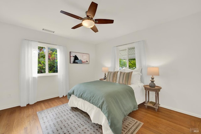 1645 Georgia St, Napa, CA 94559 - bedroom with multiple windows, baseboards, and wood finished floors