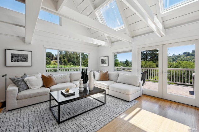 523 W Fairview Ave, Mill Valley, CA 94941 - living room with a skylight, beamed ceiling, wood finished floors, plenty of natural light, and high vaulted ceiling