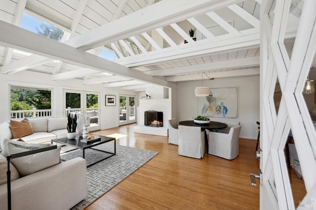523 W Fairview Ave, Mill Valley, CA 94941 - living room featuring light wood finished floors, healthy amount of natural light, a brick fireplace, and wooden ceiling