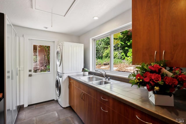 523 W Fairview Ave, Mill Valley, CA 94941 - laundry area with stacked washing machine and dryer, attic access, and cabinet space