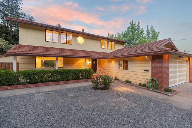 522 Blackstone Dr, San Rafael, CA 94903 - view of front of property featuring an attached garage, a tiled roof, and driveway