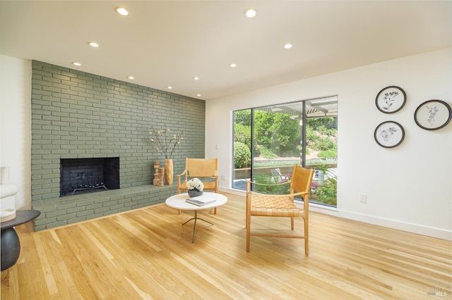 522 Blackstone Dr, San Rafael, CA 94903 - living area with recessed lighting, light wood-type flooring, a brick fireplace, and baseboards