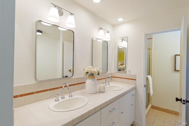 522 Blackstone Dr, San Rafael, CA 94903 - bathroom featuring double vanity, a stall shower, decorative backsplash, tile patterned flooring, and recessed lighting