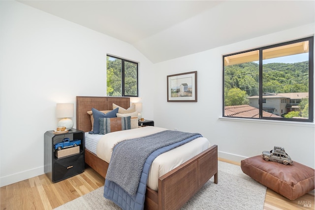 522 Blackstone Dr, San Rafael, CA 94903 - bedroom featuring vaulted ceiling, wood finished floors, and baseboards