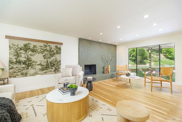522 Blackstone Dr, San Rafael, CA 94903 - living room featuring light wood-style flooring, recessed lighting, a fireplace, and baseboards