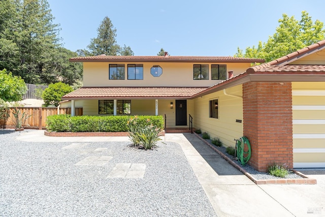 522 Blackstone Dr, San Rafael, CA 94903 - mediterranean / spanish home featuring a tiled roof, covered porch, and stucco siding