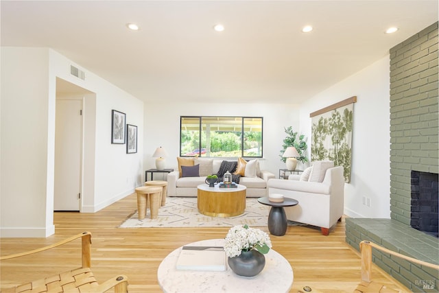 522 Blackstone Dr, San Rafael, CA 94903 - living room featuring light wood-style flooring, a fireplace, recessed lighting, and baseboards