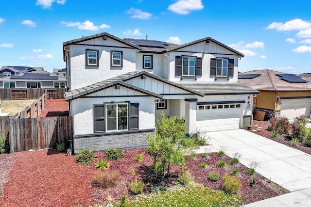 544 Oakham Dr, Vacaville, CA 95687 - traditional home with roof mounted solar panels, an attached garage, driveway, stucco siding, and board and batten siding
