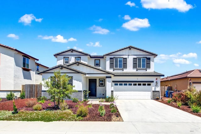 544 Oakham Dr, Vacaville, CA 95687 - view of front facade featuring board and batten siding, an attached garage, driveway, and stucco siding