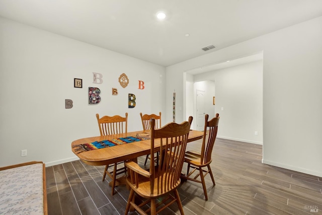 544 Oakham Dr, Vacaville, CA 95687 - dining room featuring wood finished floors, recessed lighting, and baseboards