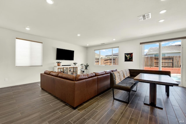 544 Oakham Dr, Vacaville, CA 95687 - living room featuring dark wood-type flooring, recessed lighting, and baseboards