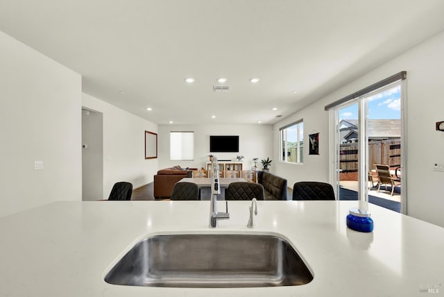 544 Oakham Dr, Vacaville, CA 95687 - kitchen featuring recessed lighting, a sink, light countertops, and open floor plan