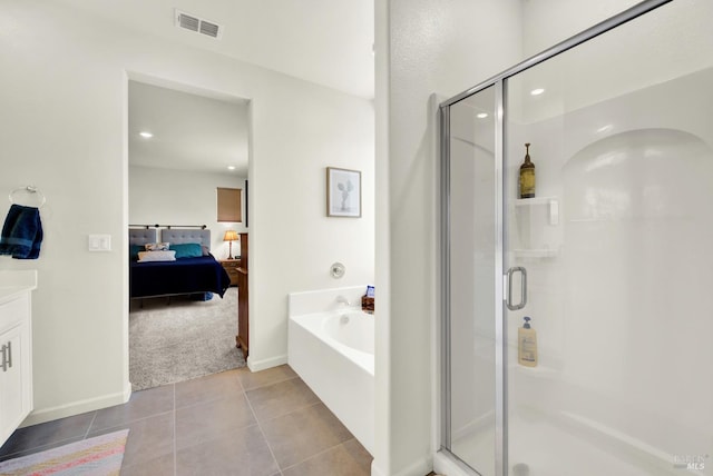 544 Oakham Dr, Vacaville, CA 95687 - full bathroom featuring ensuite bath, a stall shower, a garden tub, vanity, and recessed lighting