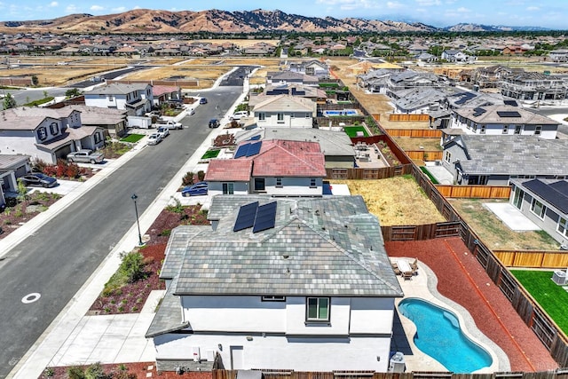 544 Oakham Dr, Vacaville, CA 95687 - aerial perspective of suburban area with a mountainous background and a pool area