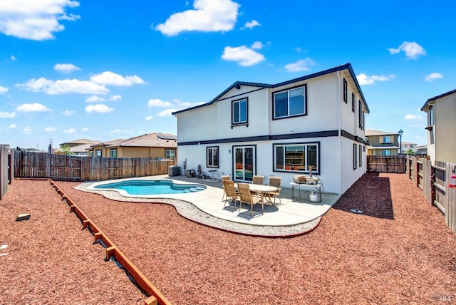 544 Oakham Dr, Vacaville, CA 95687 - rear view of property featuring a patio, a fenced backyard, central AC unit, and stucco siding