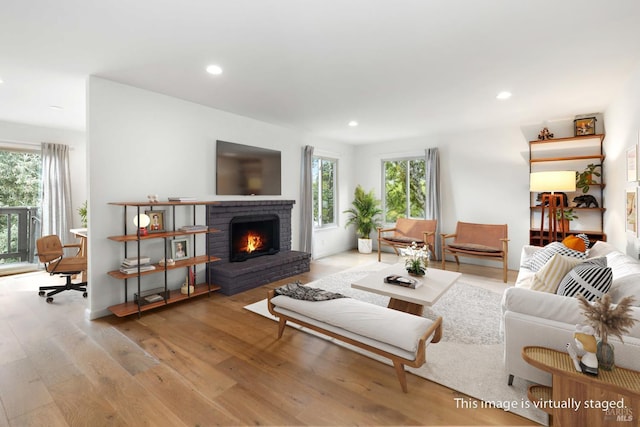 324 Sheffield Ave, Mill Valley, CA 94941 - living area with wood finished floors, recessed lighting, and a brick fireplace