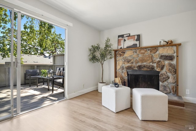 1259 Royal Oak Ter Unit A, Novato, CA 94947 - sitting room with wood finished floors, baseboards, and a fireplace