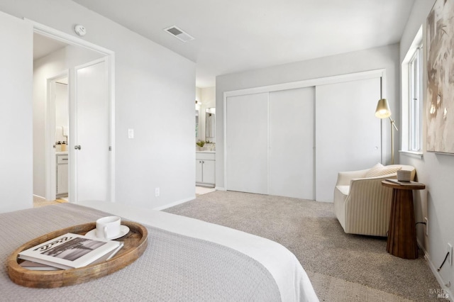 1259 Royal Oak Ter Unit A, Novato, CA 94947 - bedroom with carpet, a closet, and ensuite bathroom