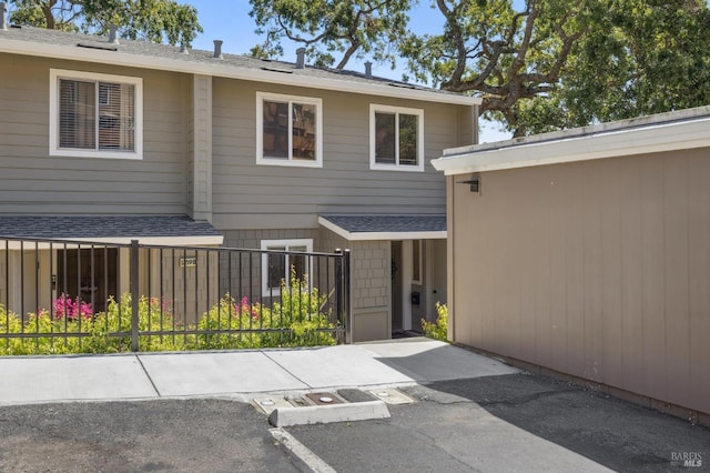 1259 Royal Oak Ter Unit A, Novato, CA 94947 - property entrance with roof with shingles and a gate