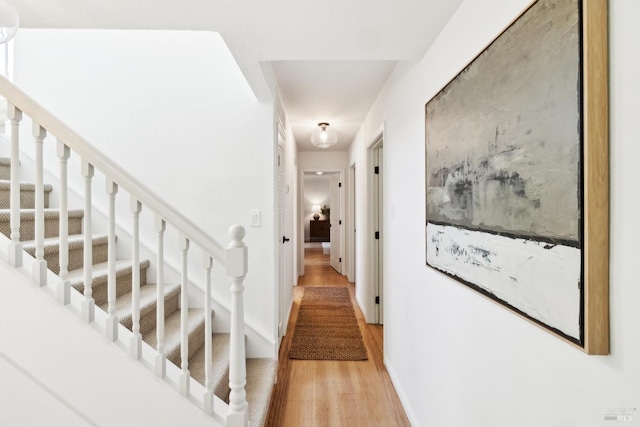 2647 Heatherstone Dr, San Rafael, CA 94903 - corridor featuring light wood finished floors and stairs