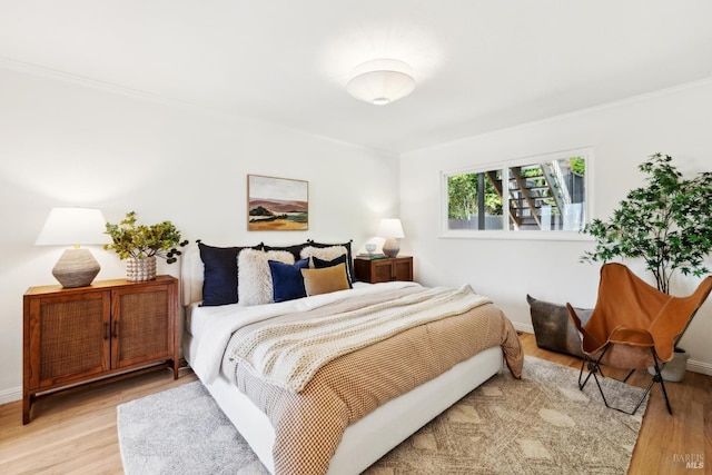 2647 Heatherstone Dr, San Rafael, CA 94903 - bedroom with light wood-style floors, ornamental molding, and baseboards