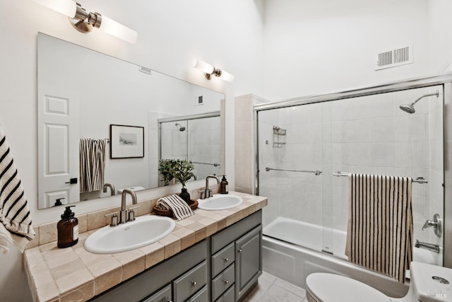 2647 Heatherstone Dr, San Rafael, CA 94903 - bathroom with double vanity, shower / bath combination with glass door, toilet, and radiator
