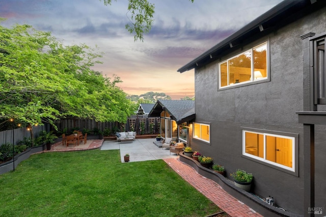 2647 Heatherstone Dr, San Rafael, CA 94903 - yard at dusk featuring a patio area