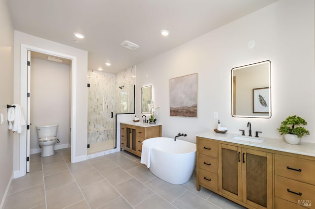1970 Bent Tree Pl, Santa Rosa, CA 95404 - bathroom with a stall shower, two vanities, tile patterned floors, a freestanding tub, and recessed lighting