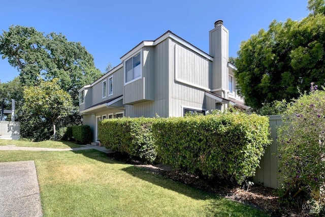 52 Margarita Ter, Novato, CA 94947 - view of home's exterior featuring a chimney and a yard