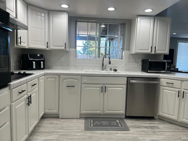 69 Eastside Cir, Petaluma, CA 94954 - kitchen featuring appliances with stainless steel finishes, a sink, white cabinets, recessed lighting, and decorative backsplash