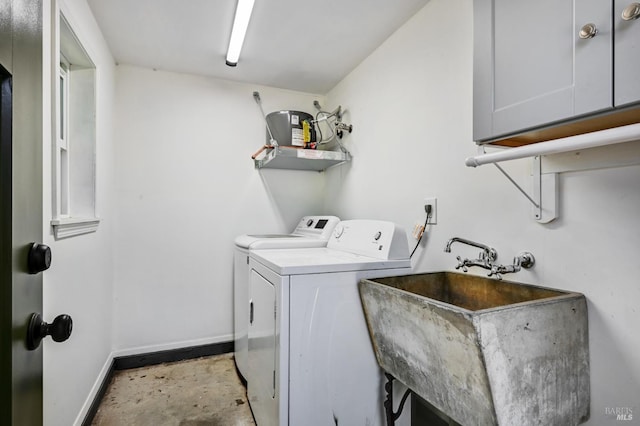 718 Charles St, Santa Rosa, CA 95404 - laundry area featuring washer and clothes dryer, baseboards, and cabinet space