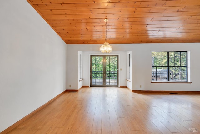 19828 Greenview Dr, Twain Harte, CA 95383 - spare room with a chandelier, wooden ceiling, lofted ceiling, baseboards, and light wood-style floors
