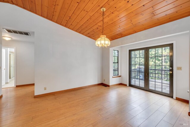 19828 Greenview Dr, Twain Harte, CA 95383 - unfurnished room with a chandelier, wooden ceiling, baseboards, french doors, and light wood-style floors
