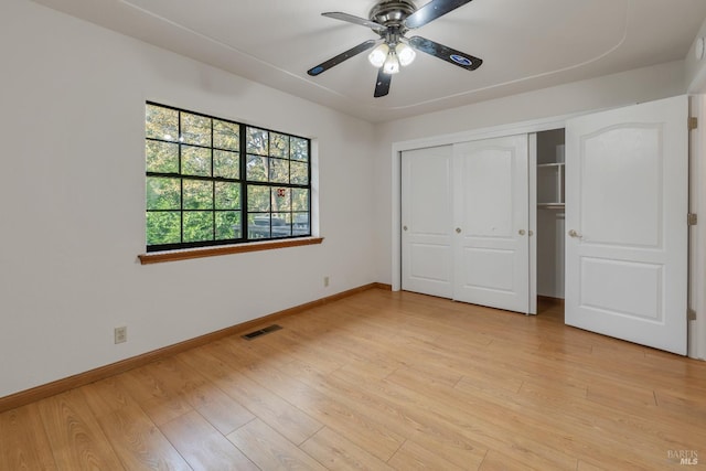 19828 Greenview Dr, Twain Harte, CA 95383 - unfurnished bedroom with baseboards, light wood-style floors, a closet, and a ceiling fan