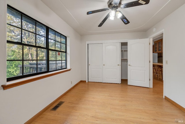19828 Greenview Dr, Twain Harte, CA 95383 - unfurnished bedroom with baseboards, light wood finished floors, a closet, and a ceiling fan