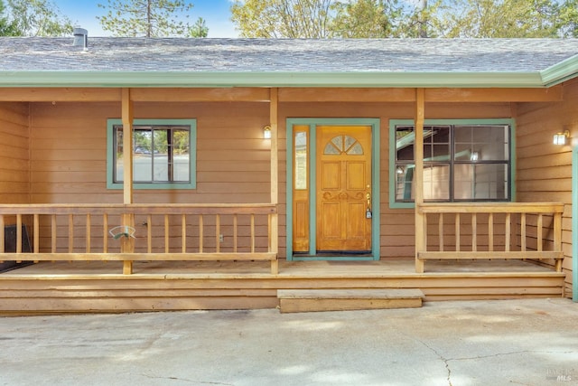 19828 Greenview Dr, Twain Harte, CA 95383 - view of exterior entry with a shingled roof