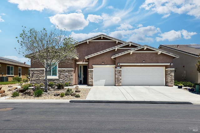 278 Longspur Dr, Rio Vista, CA 94571 - craftsman inspired home with stone siding, an attached garage, driveway, stucco siding, and a tiled roof