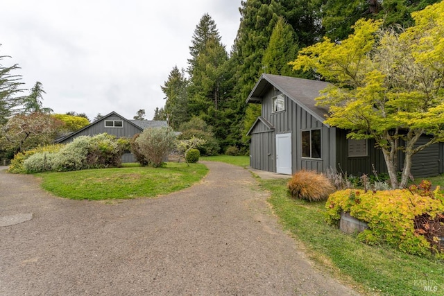 43390 Comptche Ukiah Rd, Mendocino, CA 95460 - view of home's exterior featuring board and batten siding and dirt driveway
