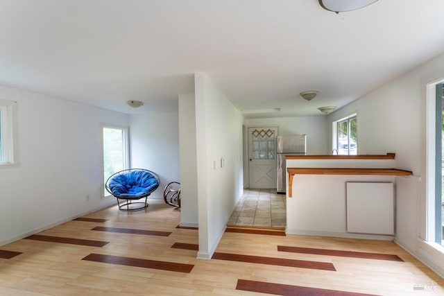 43390 Comptche Ukiah Rd, Mendocino, CA 95460 - interior space featuring light wood-type flooring, healthy amount of natural light, and baseboards