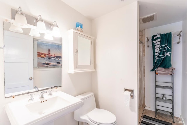 43390 Comptche Ukiah Rd, Mendocino, CA 95460 - bathroom with a tile shower, toilet, and a sink