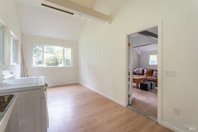 43390 Comptche Ukiah Rd, Mendocino, CA 95460 - laundry room with light wood-style floors, washing machine and clothes dryer, and baseboards
