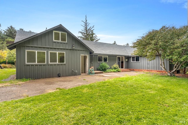 43390 Comptche Ukiah Rd, Mendocino, CA 95460 - view of front facade featuring board and batten siding, a shingled roof, and a front yard