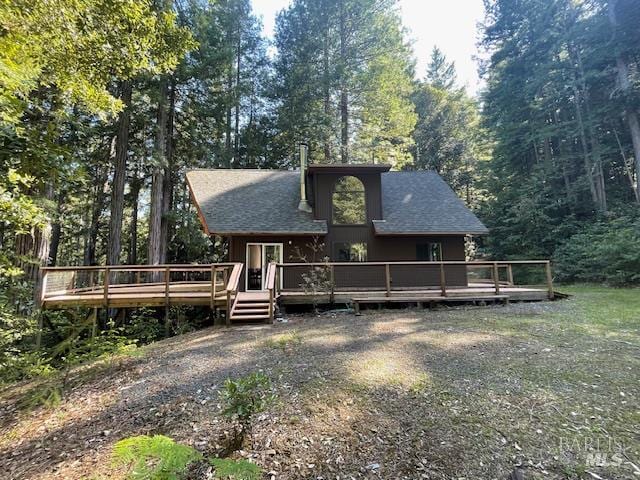 35905 Hauser Bridge Rd # J, Cazadero, CA 95421 - view of front of property featuring a wooden deck and roof with shingles
