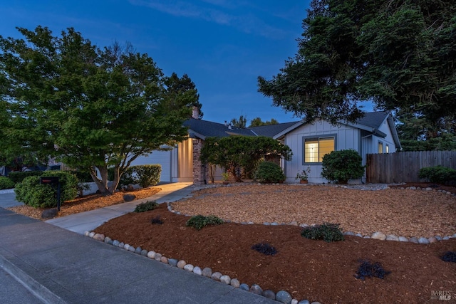 2010 Caulfield Ln, Petaluma, CA 94954 - view of front of house featuring an attached garage, board and batten siding, and concrete driveway