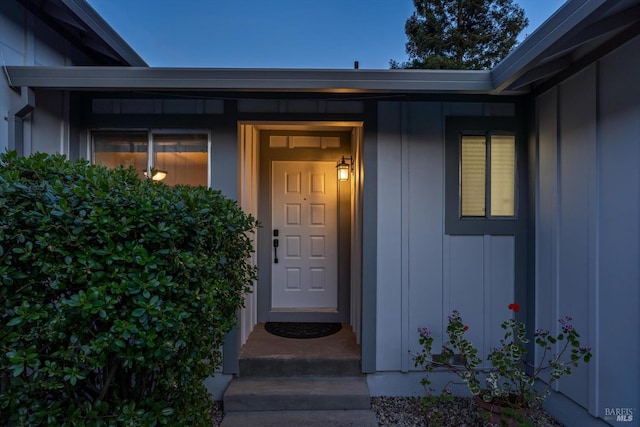 2010 Caulfield Ln, Petaluma, CA 94954 - doorway to property featuring board and batten siding