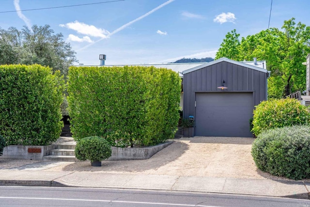 1005 Valley View St, Saint Helena, CA 94574 - view of front of property featuring board and batten siding and a garage