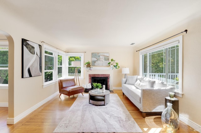 740 Valle Vista Ave, Vallejo, CA 94590 - living area with light wood-style flooring, plenty of natural light, and arched walkways